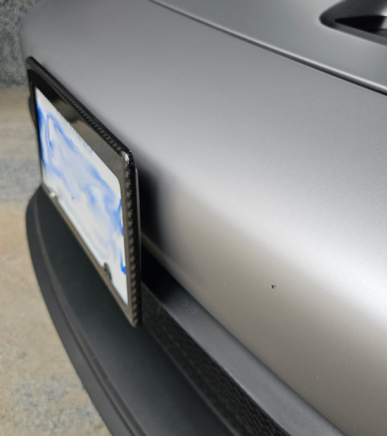 Front plate attached to clips